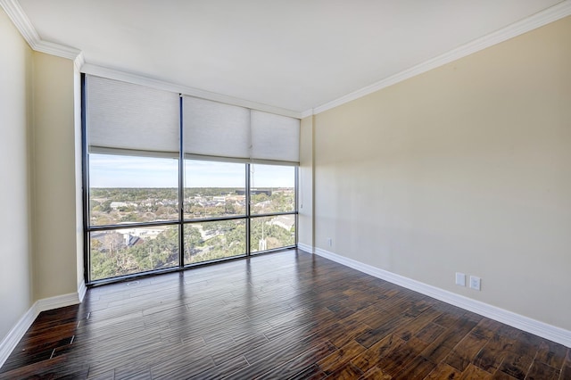 empty room with ornamental molding, dark hardwood / wood-style floors, and floor to ceiling windows