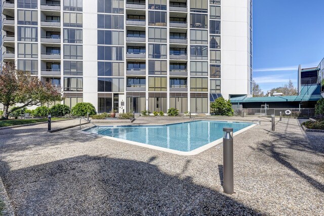 view of pool featuring a patio area