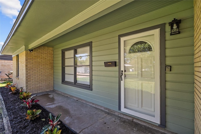 entrance to property with a porch