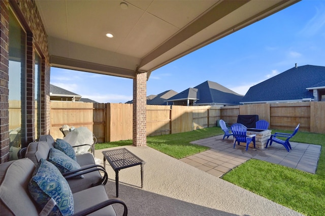 view of patio featuring a fire pit