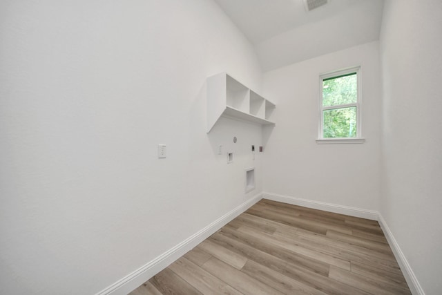 17733 Gold Saddle Ln, Magnolia, TX 77354 - laundry area with electric dryer hookup, laundry area, hookup for a gas dryer, light wood-type flooring, and baseboards