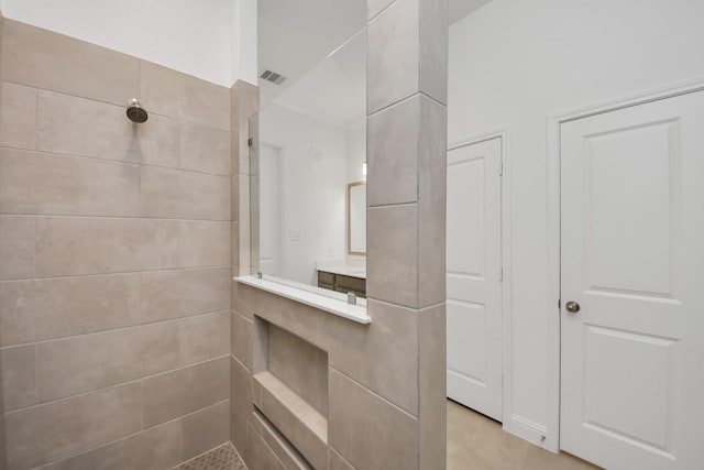 17733 Gold Saddle Ln, Magnolia, TX 77354 - full bathroom featuring tiled shower and visible vents