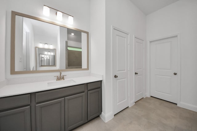 17733 Gold Saddle Ln, Magnolia, TX 77354 - bathroom featuring baseboards and vanity