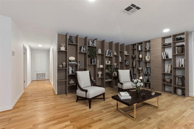 sitting room featuring light wood-type flooring