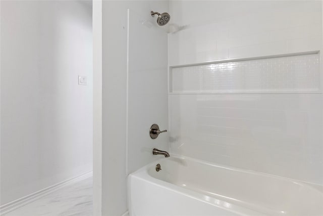 bathroom with shower / washtub combination