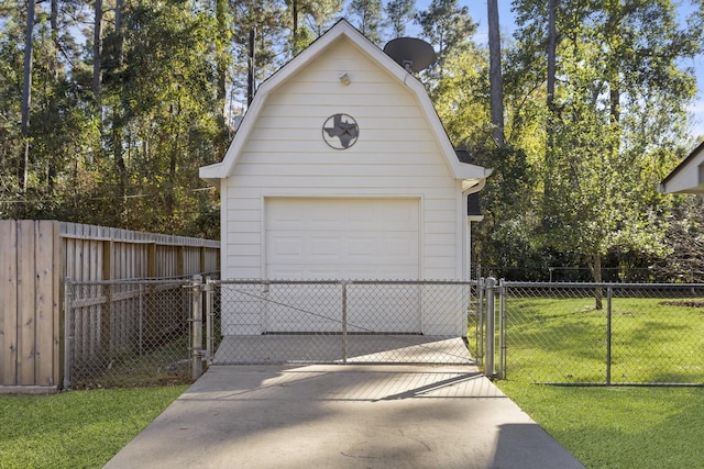 garage featuring a yard