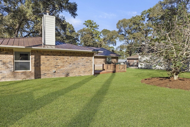 view of yard featuring a deck