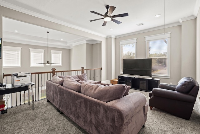 living room with ceiling fan, crown molding, and carpet floors