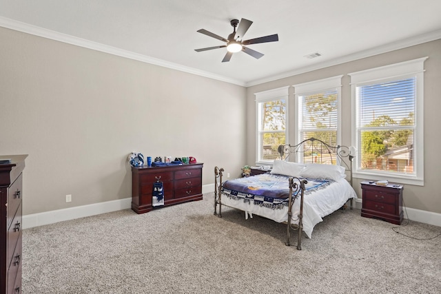 bedroom featuring ceiling fan, light colored carpet, and ornamental molding