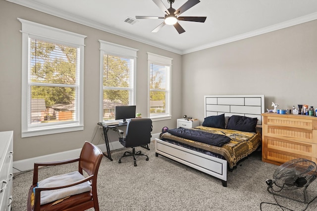 bedroom featuring ceiling fan, carpet, and ornamental molding