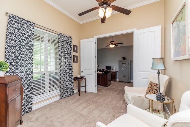 sitting room featuring ceiling fan, ornamental molding, and light carpet