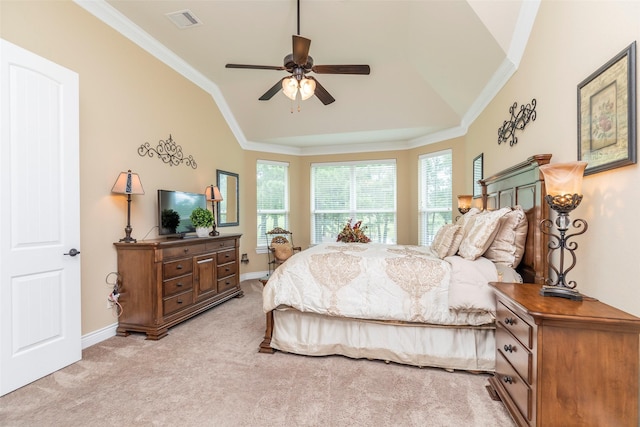 bedroom featuring light colored carpet, vaulted ceiling, ceiling fan, and ornamental molding