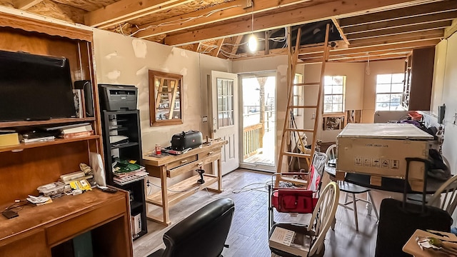 miscellaneous room featuring hardwood / wood-style flooring