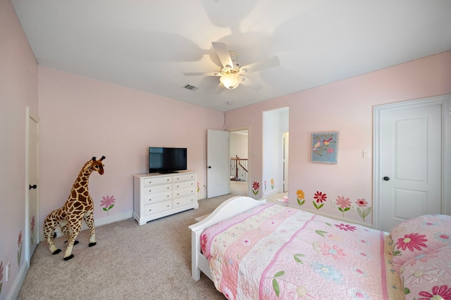 bedroom featuring ceiling fan and light colored carpet