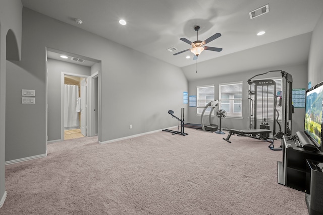 exercise area with light colored carpet, ceiling fan, and lofted ceiling