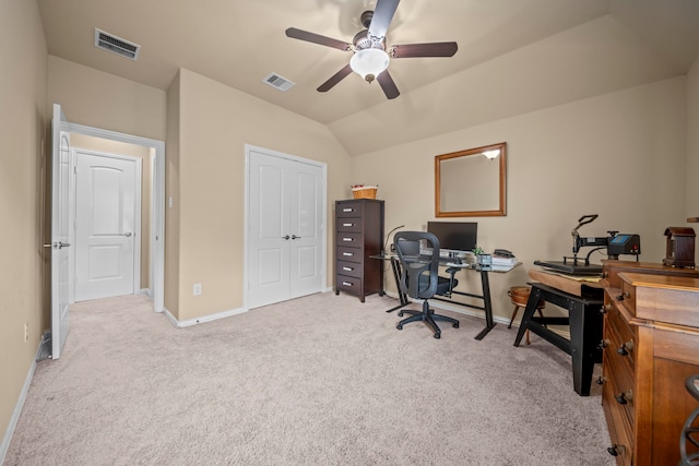 office space with light colored carpet and ceiling fan