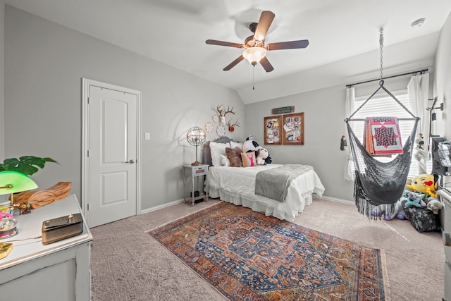 bedroom featuring carpet, ceiling fan, and vaulted ceiling