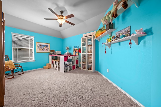 recreation room with ceiling fan, lofted ceiling, and carpet floors