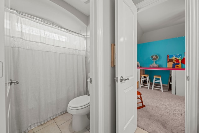 bathroom featuring tile patterned flooring and toilet