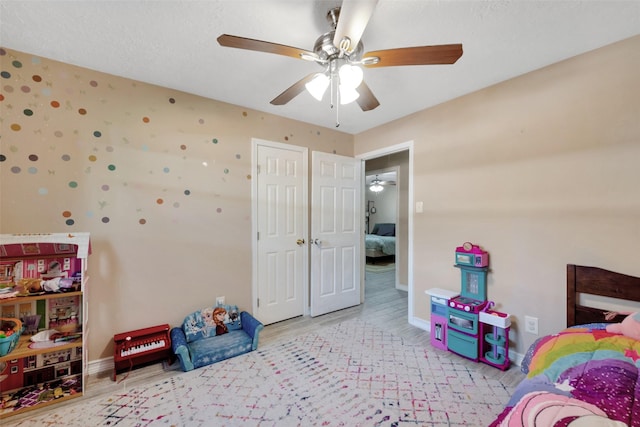 bedroom featuring ceiling fan