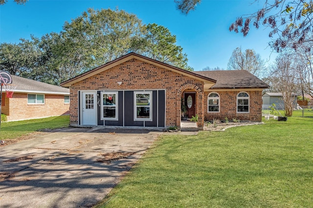 ranch-style house with a front lawn