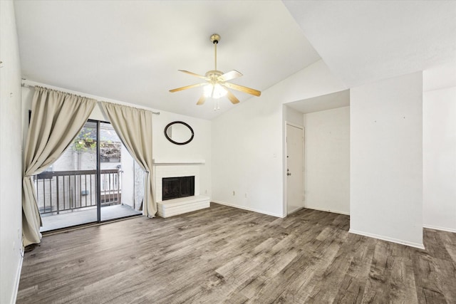 unfurnished living room featuring hardwood / wood-style floors, ceiling fan, and lofted ceiling