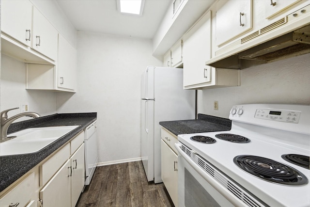 kitchen featuring white cabinets, white appliances, dark wood-type flooring, and sink