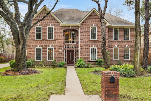 view of front facade with a front yard