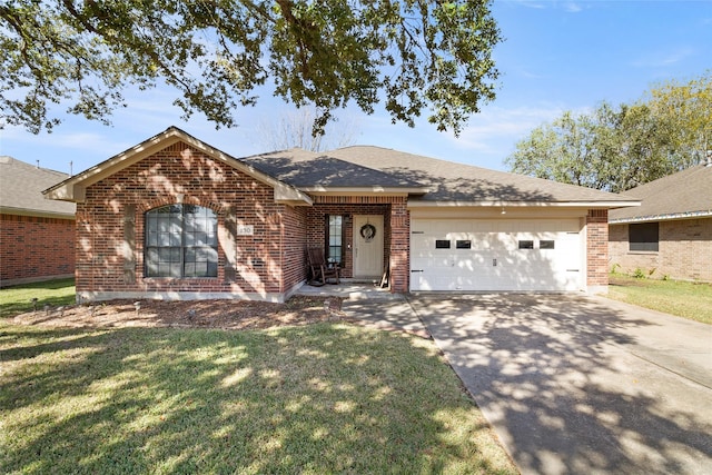 single story home featuring a front yard and a garage