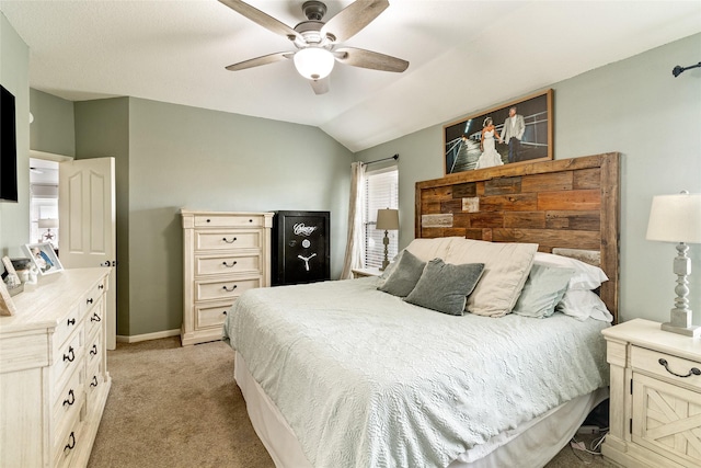 carpeted bedroom featuring ceiling fan and lofted ceiling