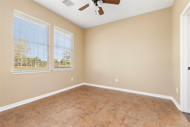 unfurnished room with ceiling fan