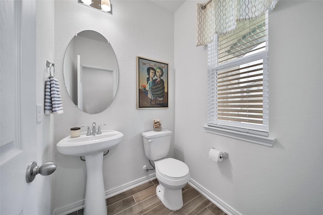 bathroom with sink and toilet