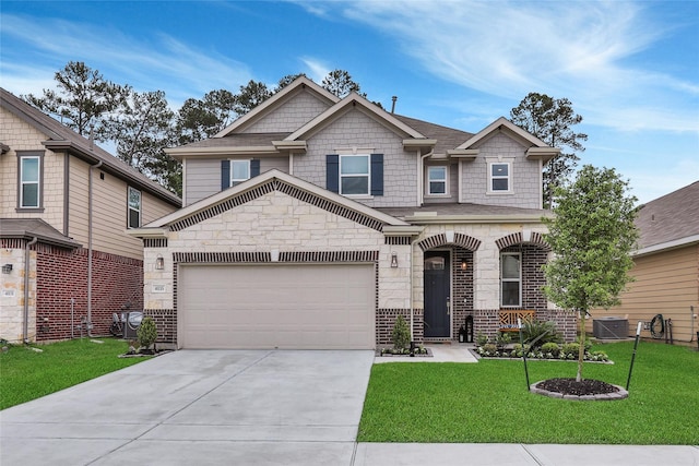 craftsman-style house with a garage, a front yard, and central AC unit