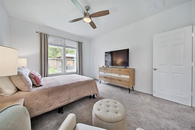 carpeted bedroom with ceiling fan