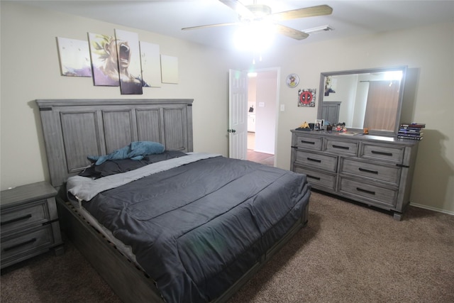 bedroom featuring dark carpet and ceiling fan