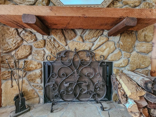 interior details with a fireplace