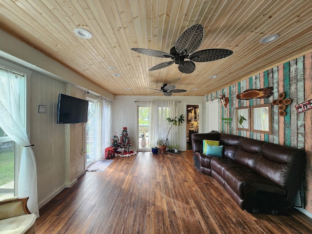 living room with wood ceiling, ceiling fan, and dark wood-type flooring