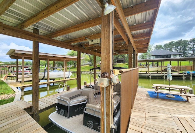 dock area featuring a water view