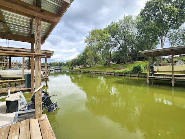 dock area featuring a water view