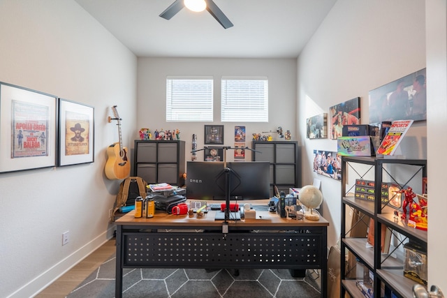 office with dark hardwood / wood-style floors and ceiling fan