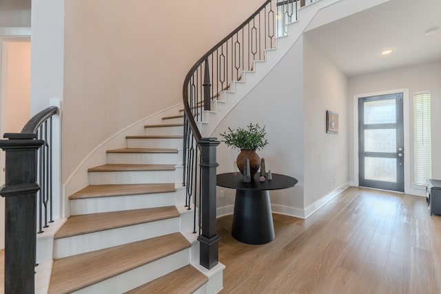 entrance foyer with hardwood / wood-style floors