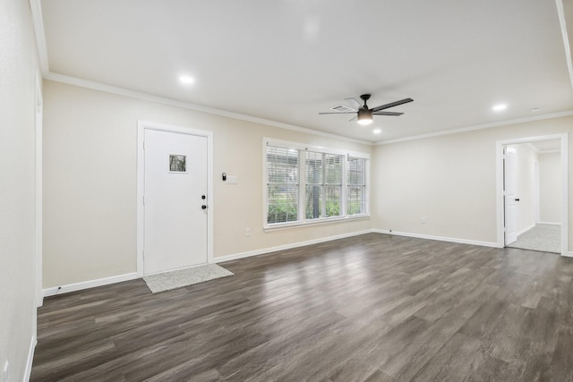 foyer entrance featuring dark hardwood / wood-style floors, ceiling fan, and ornamental molding