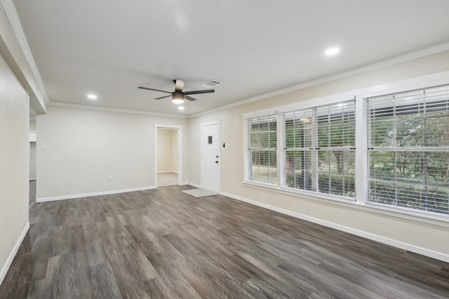 unfurnished living room with ceiling fan, dark hardwood / wood-style flooring, and ornamental molding