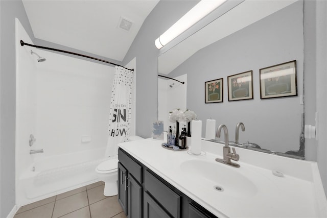 full bathroom featuring shower / bath combo, vanity, vaulted ceiling, tile patterned flooring, and toilet