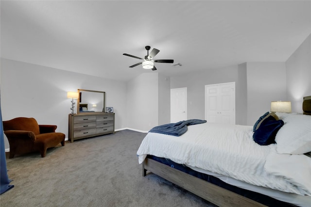 bedroom featuring ceiling fan, a closet, and carpet