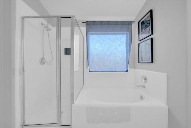 bathroom with separate shower and tub