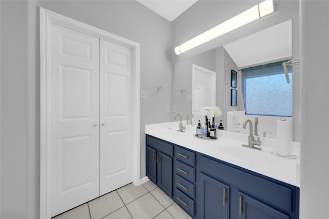 bathroom with vanity and tile patterned floors