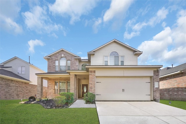 view of front of house featuring a front lawn and a garage