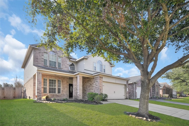 view of front property featuring a garage and a front lawn