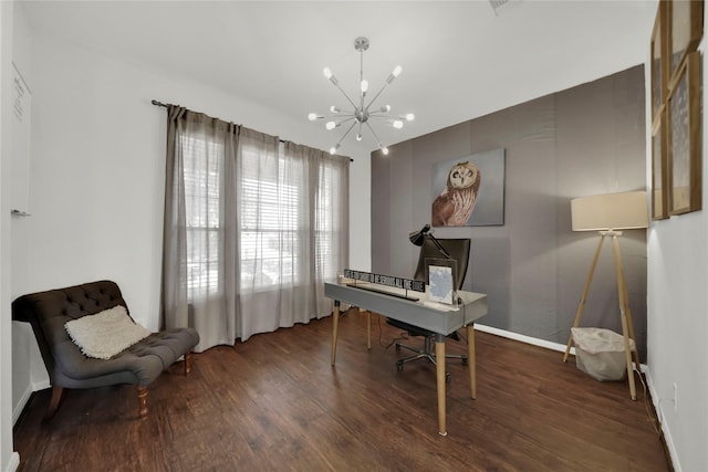 office space featuring dark wood-type flooring and a notable chandelier